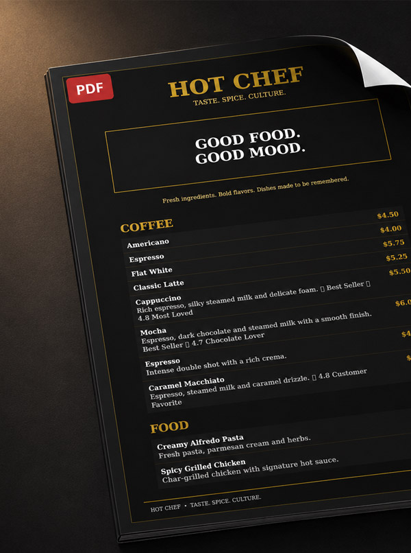 A printed Hot Chef A4 menu in black and gold, laid on a dark surface.